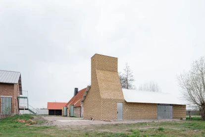 Multi-purpose Huys features a sculptural chimney along with a modern interpretation of Belgium moat farm typology